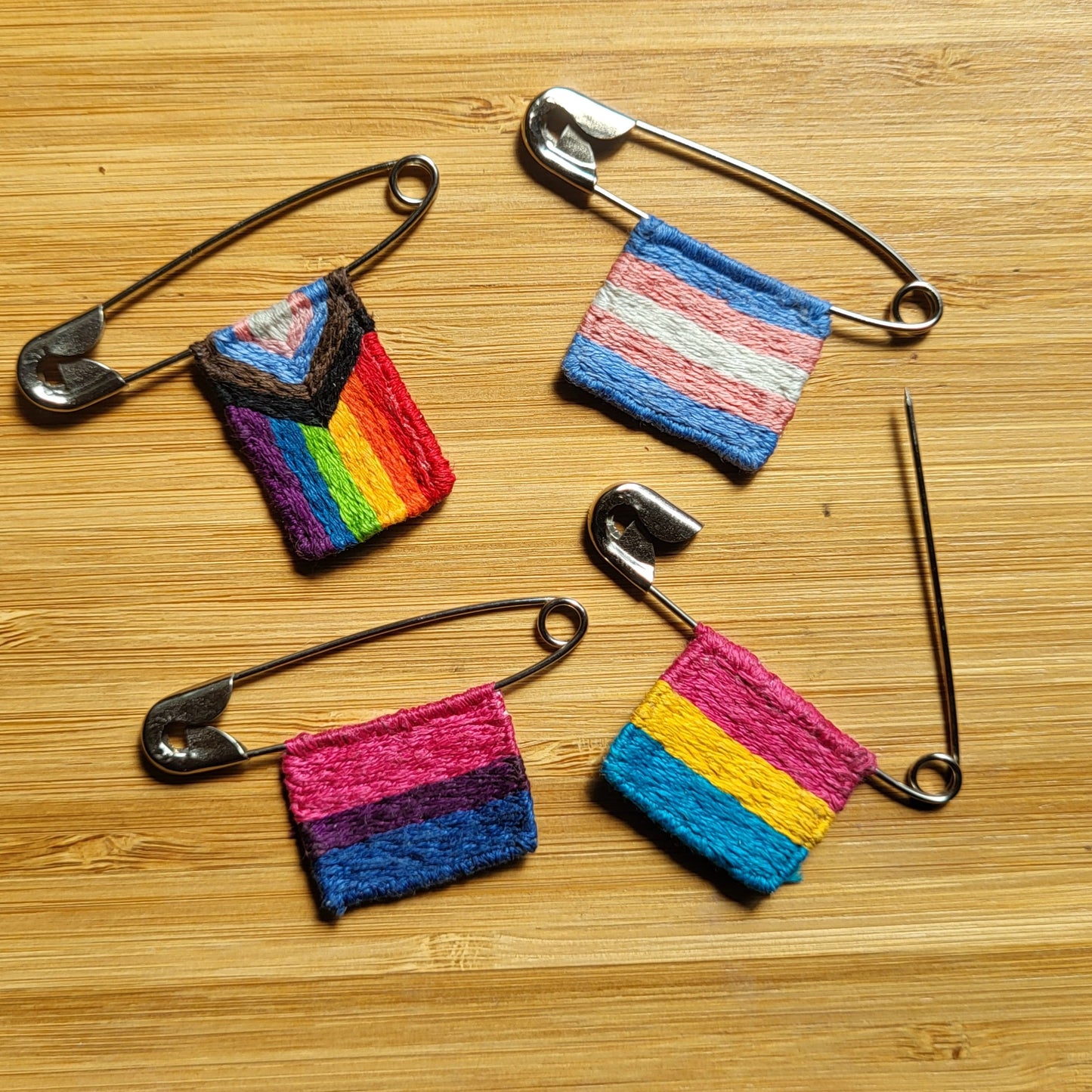 Handstitched Mini Pride Flags on Safety Pins