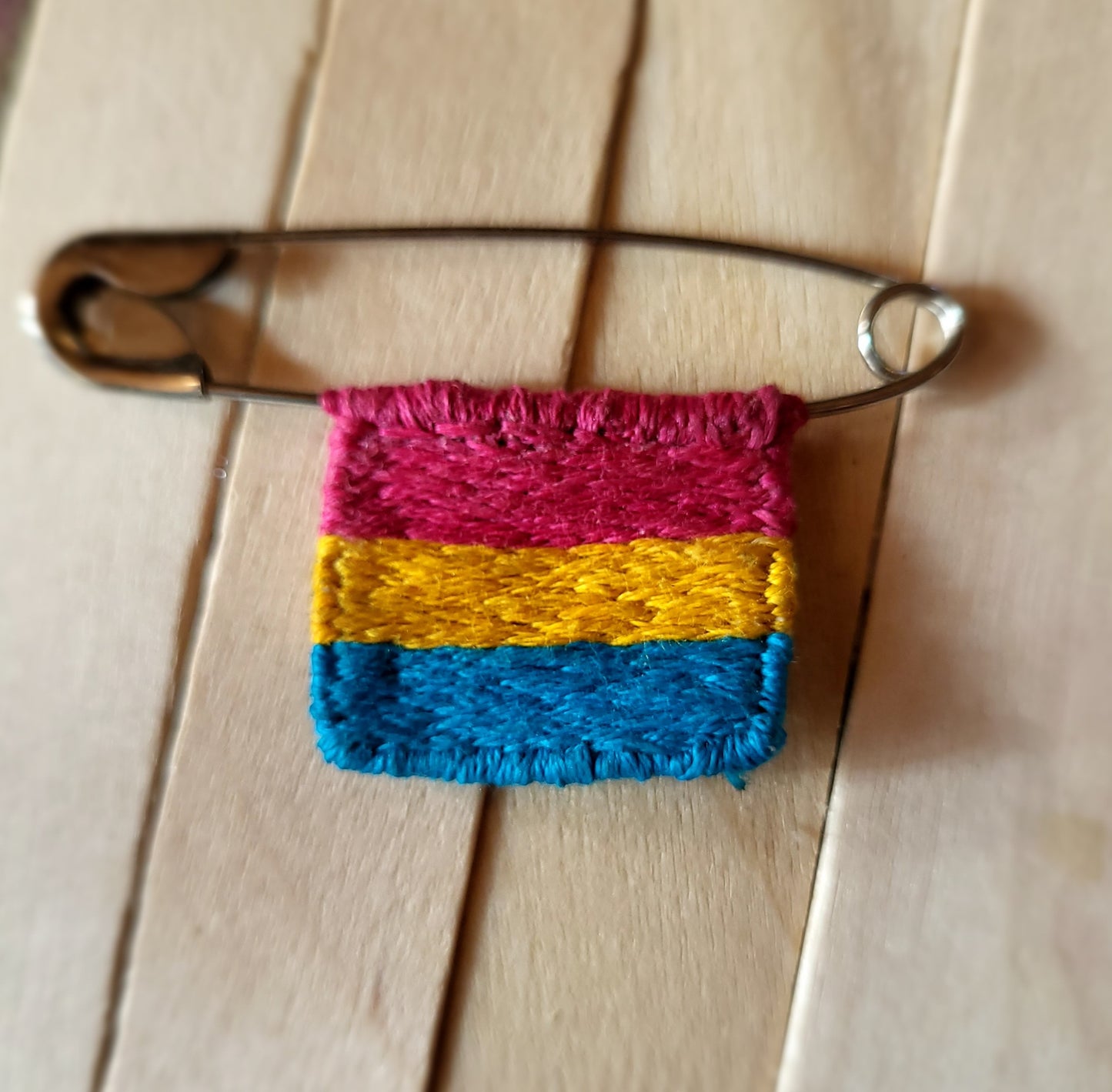 Handstitched Mini Pride Flags on Safety Pins
